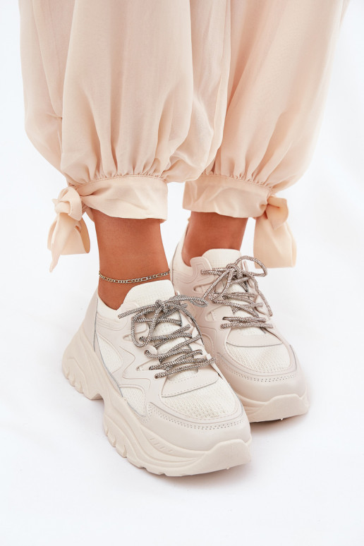 Scarpe modello sneakers Femminile con una piattaforma Ozdobnym Allacciaturam beige Evalianne
