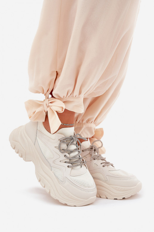 Scarpe modello sneakers Femminile con una piattaforma Ozdobnym Allacciaturam beige Evalianne