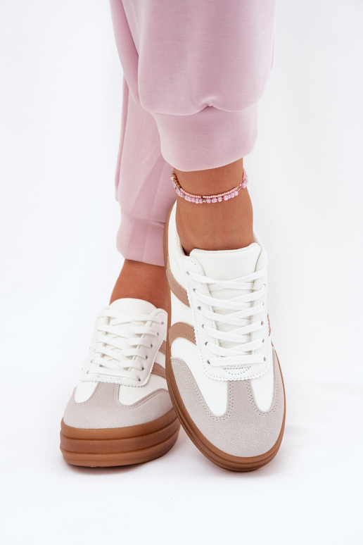 Scarpe modello sneakers Femminile con una piattaforma Colore bianco Tolianna