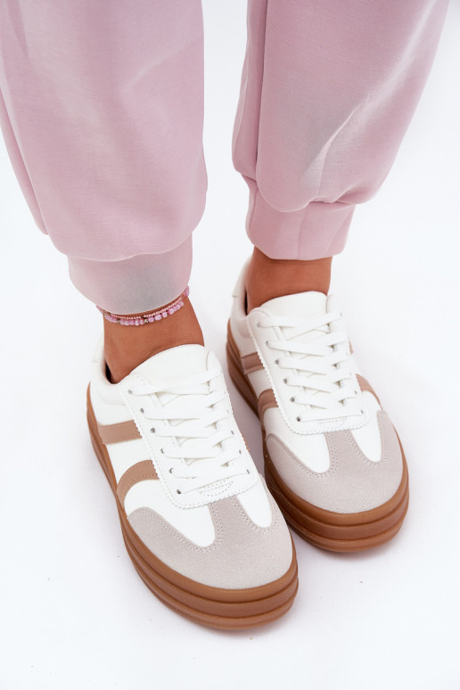 Scarpe modello sneakers Femminile con una piattaforma Colore bianco Tolianna