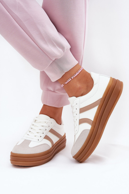 Scarpe modello sneakers Femminile con una piattaforma Colore bianco Tolianna