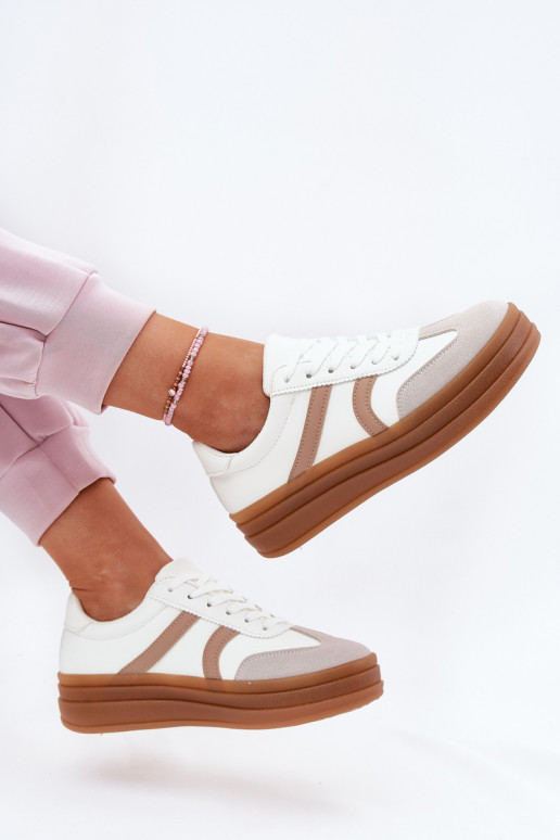 Scarpe modello sneakers Femminile con una piattaforma Colore bianco Tolianna