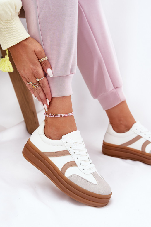 Scarpe modello sneakers Femminile con una piattaforma Colore bianco Tolianna