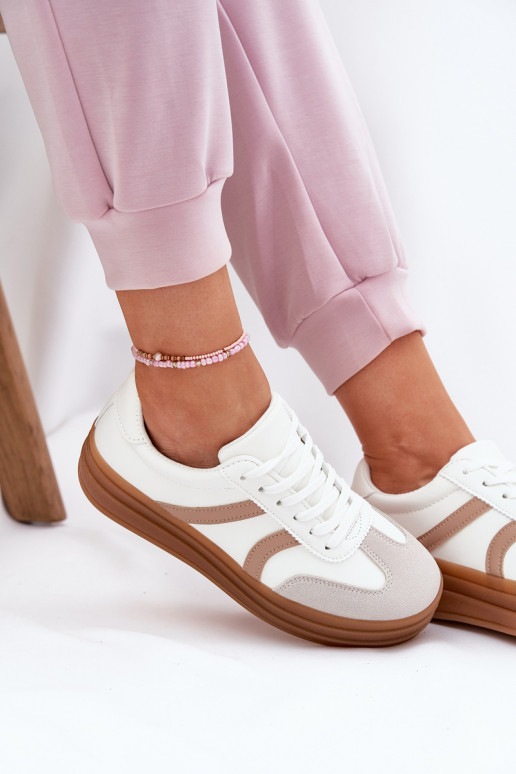 Scarpe modello sneakers Femminile con una piattaforma Colore bianco Tolianna