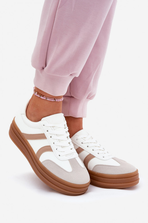 Scarpe modello sneakers Femminile con una piattaforma Colore bianco Tolianna