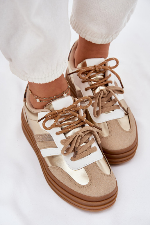 Scarpe modello sneakers Femminile con una piattaforma Z PodAójnym Allacciaturam con motivi di pelliccia di leopardo colore dorat