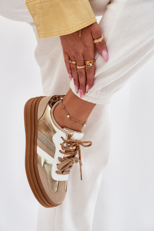 Scarpe modello sneakers Femminile con una piattaforma Z PodAójnym Allacciaturam con motivi di pelliccia di leopardo colore dorat