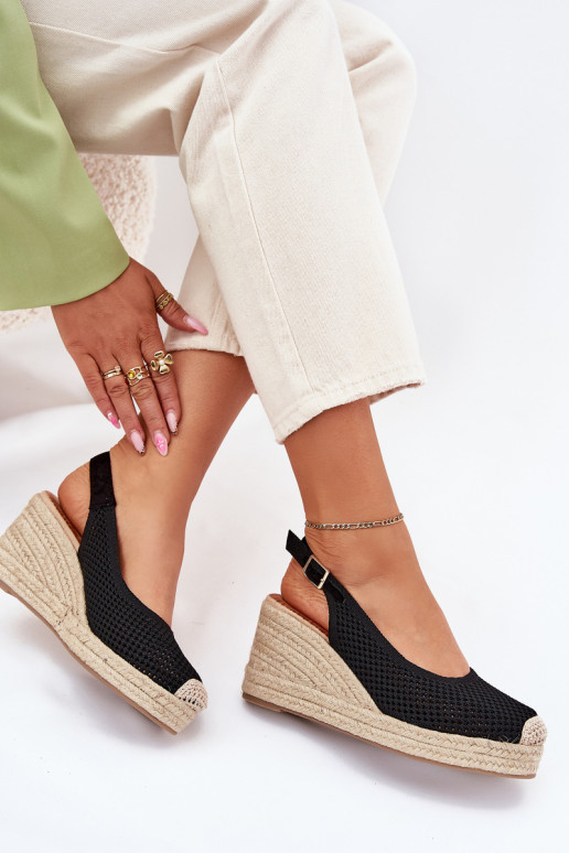 Sandali da donna Su un cuneo Con treccia colore nero Tulliata Sandali da donna Su un cuneo Con treccia colore nero Tulliata