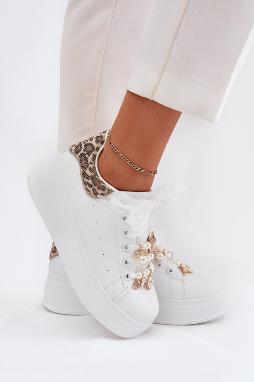 Scarpe modello sneakers Femminile con una piattaforma Z Przypinkami Colore bianco con motivi di pelliccia di leopardo Ocerdia