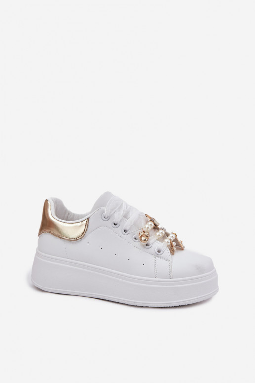 Scarpe modello sneakers Femminile con una piattaforma Z Przypinkami Bianco-colore dorato Ocerdia