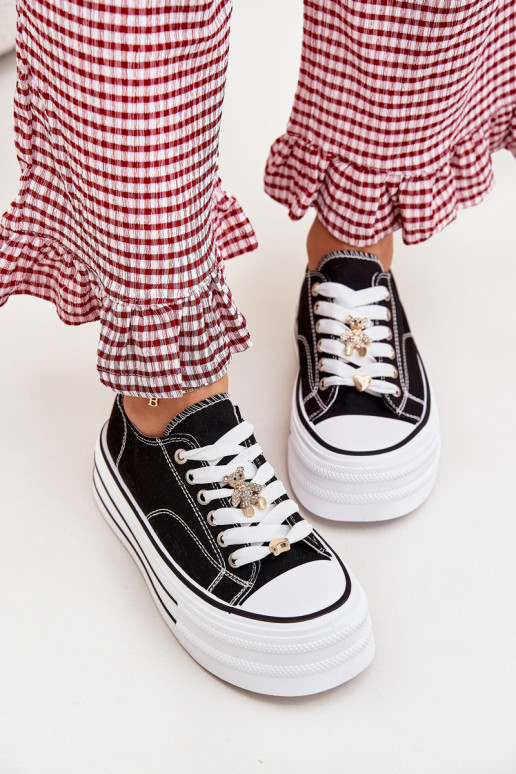 Scarpe per il tempo libero con una piattaforma Ze colore doratomi Przypinkami colore nero Fiorina