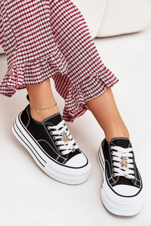 Scarpe per il tempo libero con una piattaforma Ze colore doratomi Przypinkami colore nero Fiorina