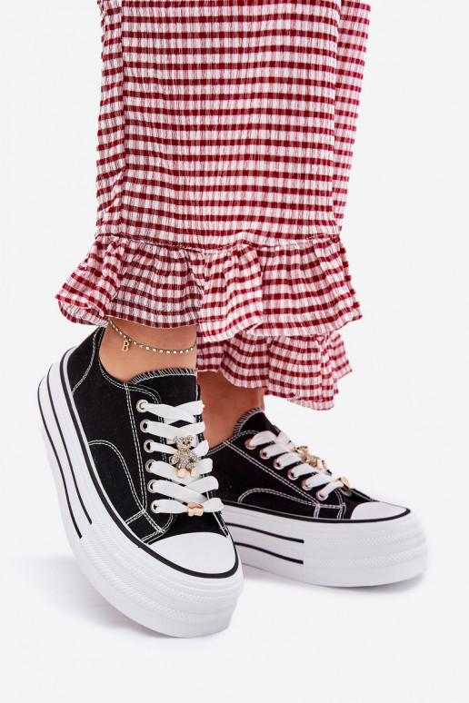 Scarpe per il tempo libero con una piattaforma Ze colore doratomi Przypinkami colore nero Fiorina