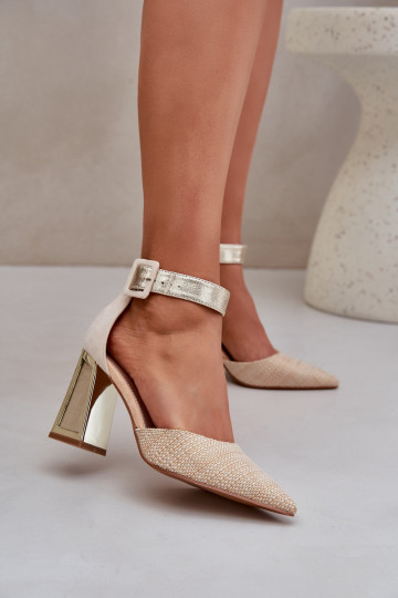 Sandali dorati con tacco...