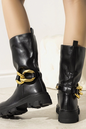 Stivaletti neri isolati con... 2