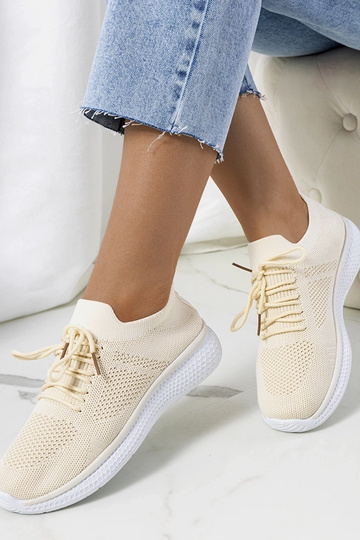 Le scarpe da ginnastica beige di Michael