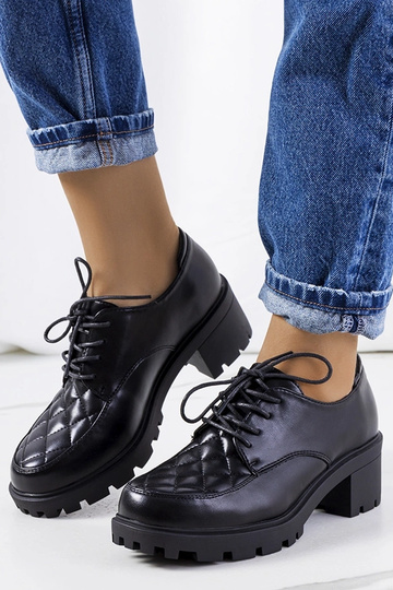 Stivaletti neri con tacco...