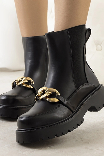 Stivaletti neri con suola...