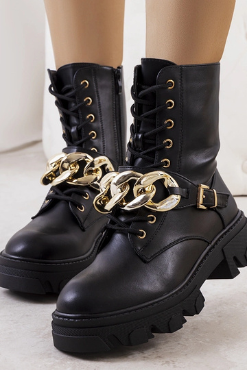 Stivaletti neri con catena...