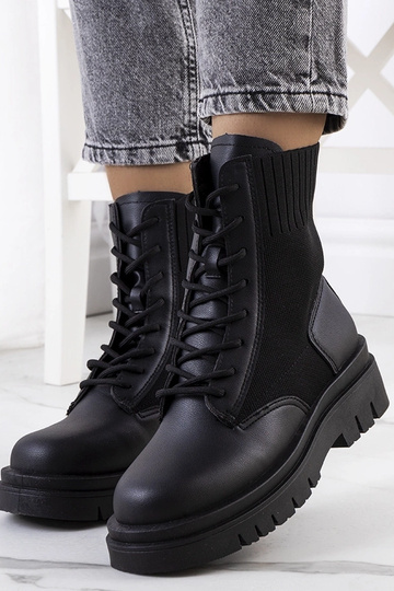 Stivaletti neri con suola...