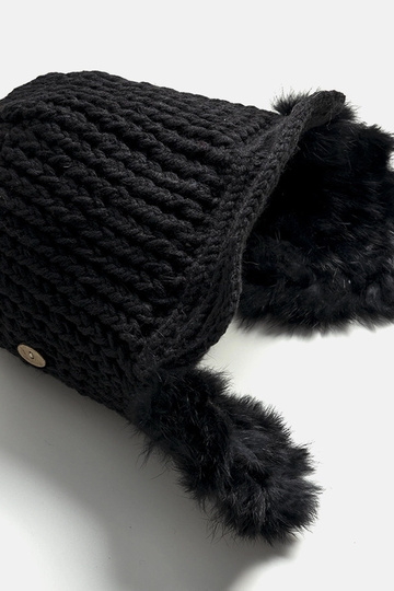 Cappello Zora nero con paraorecchie