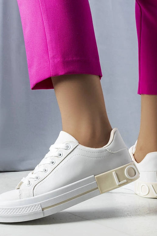 Sneakers bianche e beige decorate con...