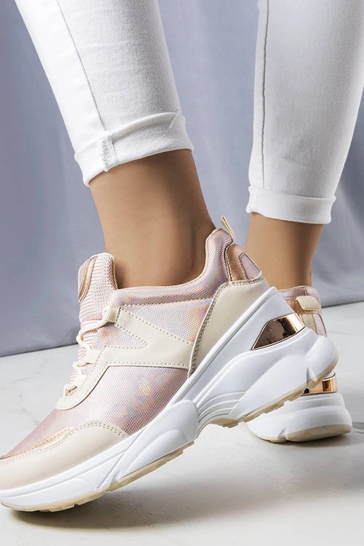 Sneakers rosa con inserti metallici...