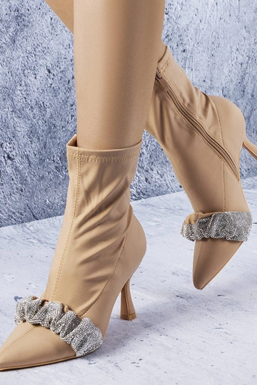 Stivaletti beige decorati...