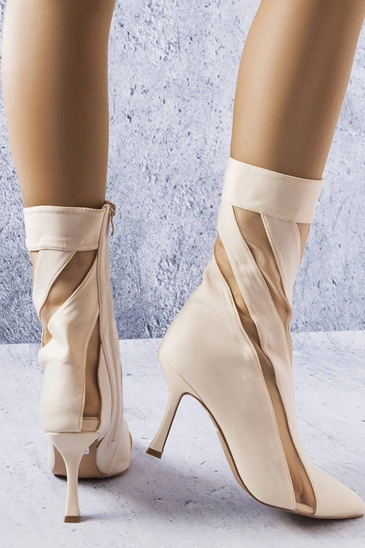 Stivaletti color sabbia con inserti...