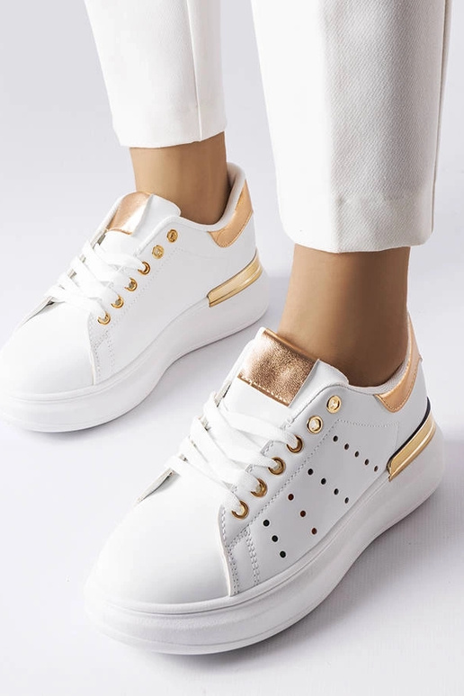 Sneakers bianche con perforazione...