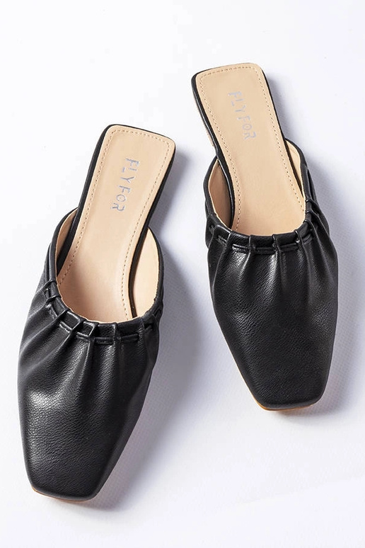 Mules nere con punta arricciata Aasiaat