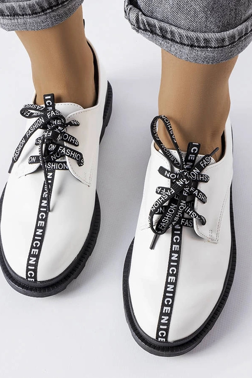 Stivaletti bianchi con suola a...