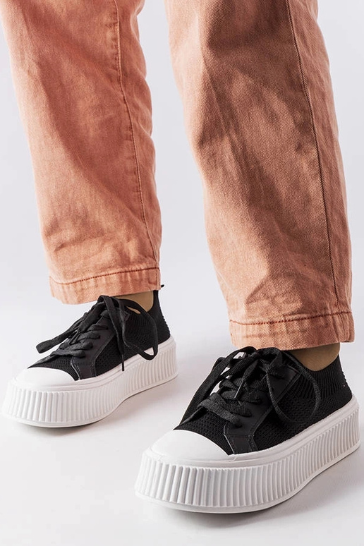 Sneakers in tessuto nero con plateau...