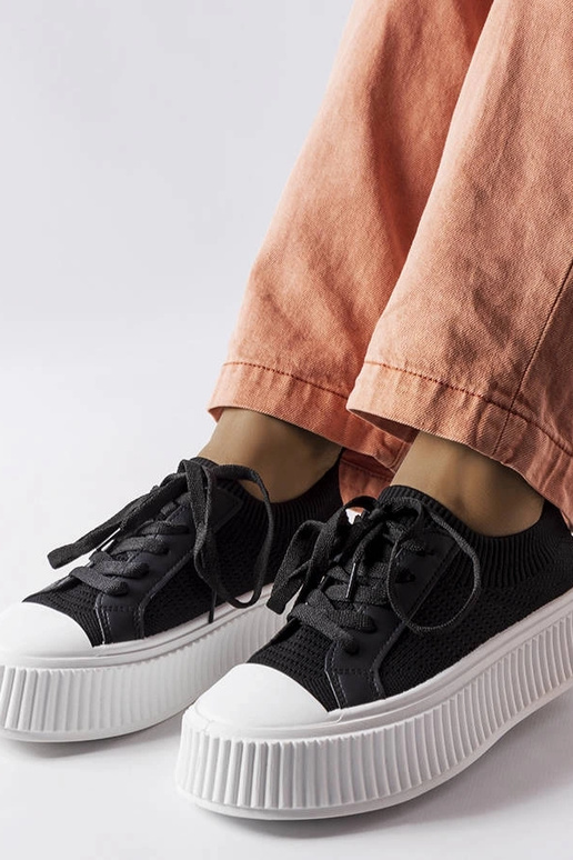 Sneakers in tessuto nero con plateau...