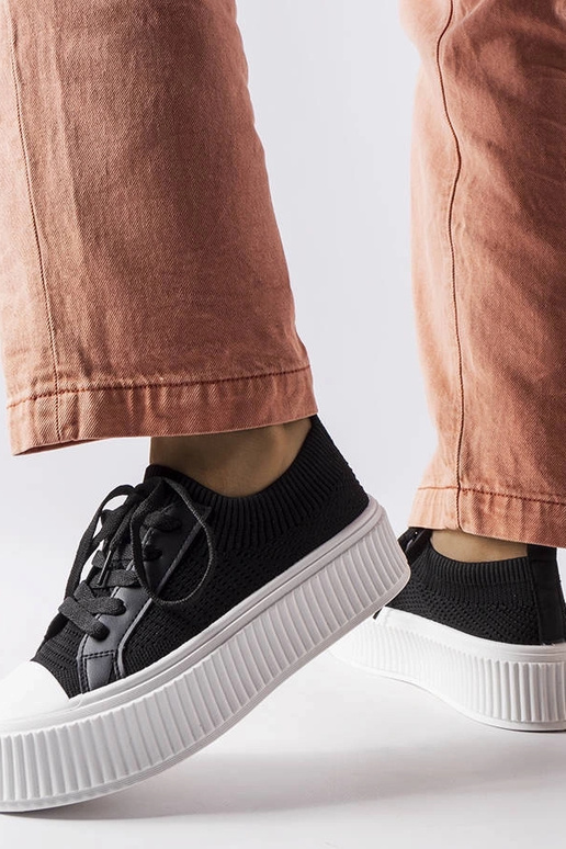 Sneakers in tessuto nero con plateau...