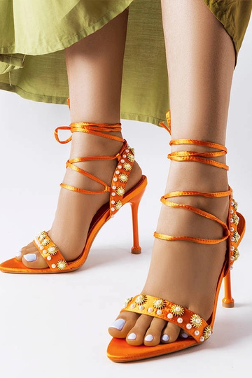 Sandali arancioni decorati...