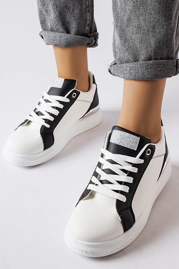 Scarpe Palais nere e bianche con accenti argentati