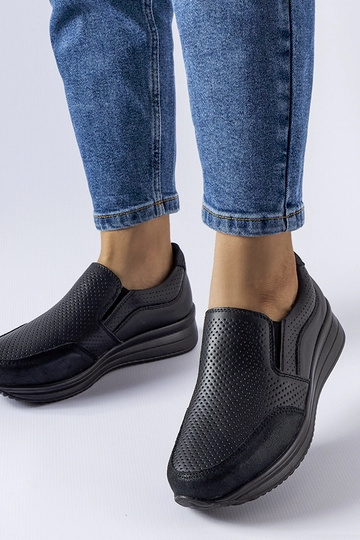 Sneakers con zeppa...