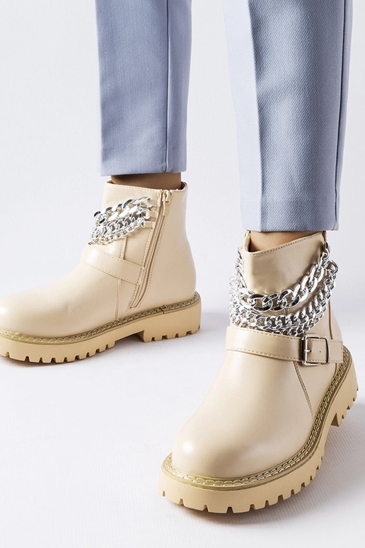 Stivaletti beige con catene...