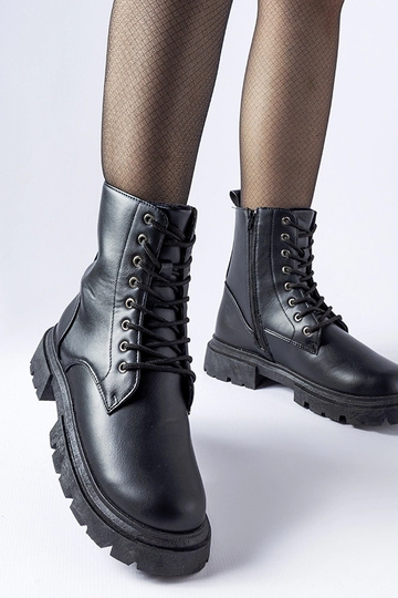 Stivali neri isolati per...