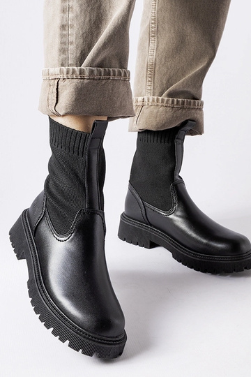 Stivaletti neri slip-on,...