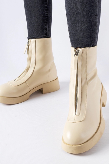 Stivaletti beige isolati con cerniera Baldo