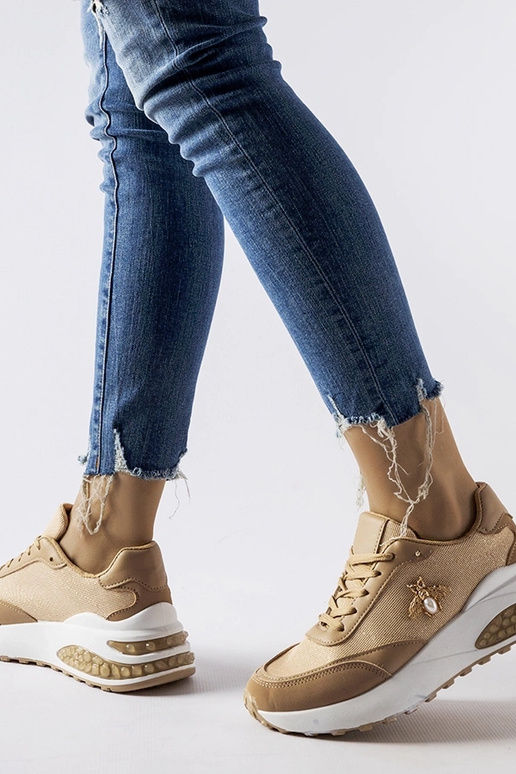 Sneakers marroni e bianche con filo...