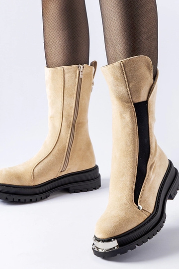 Stivaletti beige isolati...