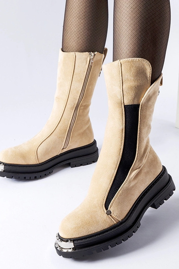 Stivaletti beige isolati... 2