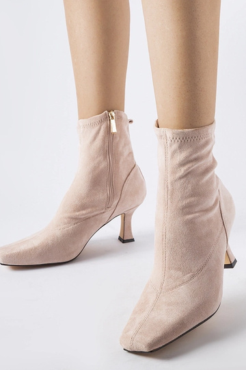 Stivaletti rosa con tacco...