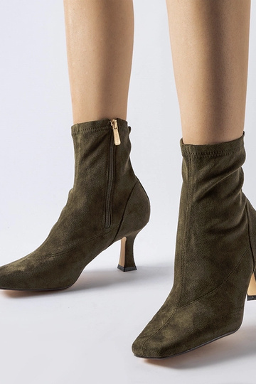 Stivaletti verdi con tacco...