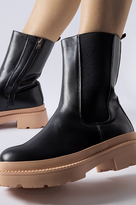 Stivaletti neri con suola rosa chiaro...