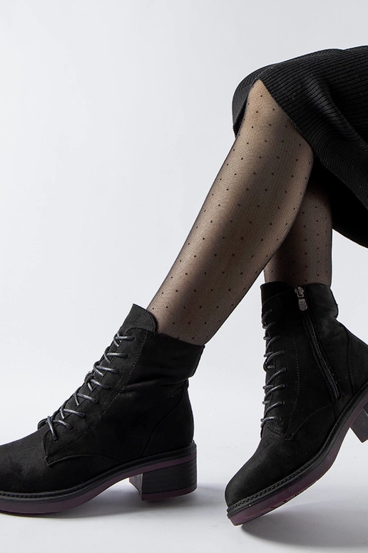 Stivaletti classici neri con suola...