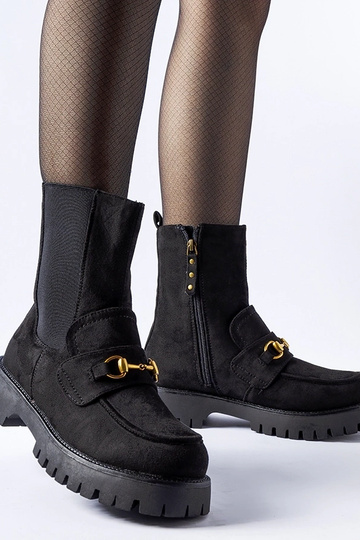 Stivaletti neri con fibbia...